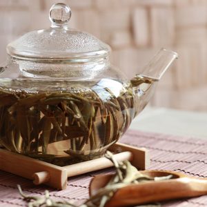 silver needle white tea infused in a teapot royaltipstea.jpg