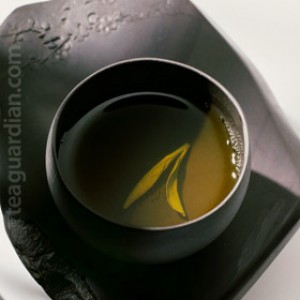 black cup with longjing