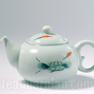 Hand-painted porcelain teapot in celadon glaze