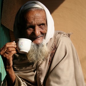 Old Bangladeshi drinking tea