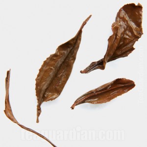 infused tealeaves of black teas: Jin Guanyin